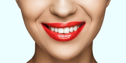 cropped-view-of-gorgeous-smiling-woman-with-red-li-2026-03-12-22-47-13-utc1-1.jpg